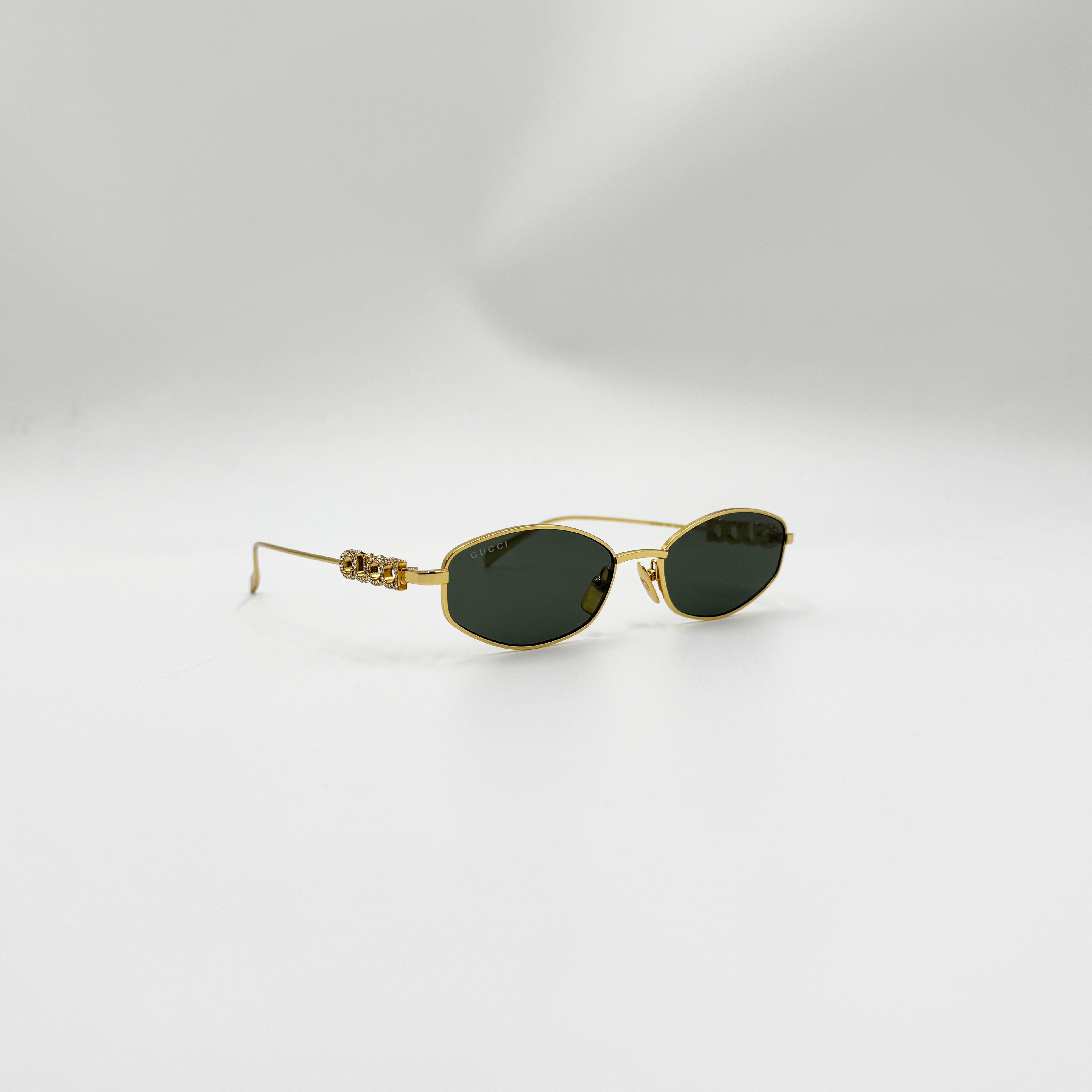 Gucci GG1802S guld med similisten