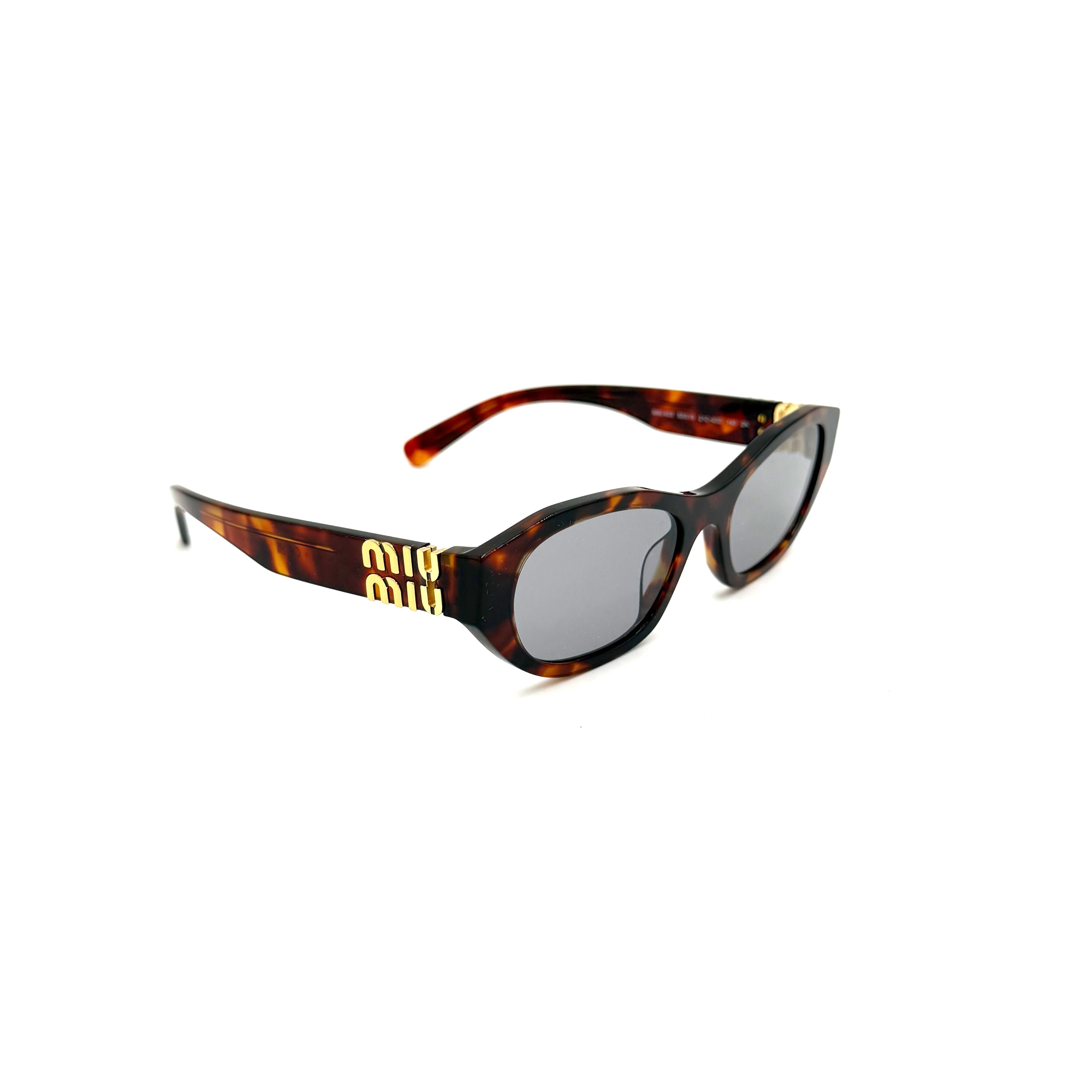 Miu Miu SMU A03 Rødlig havanna med lyse glas