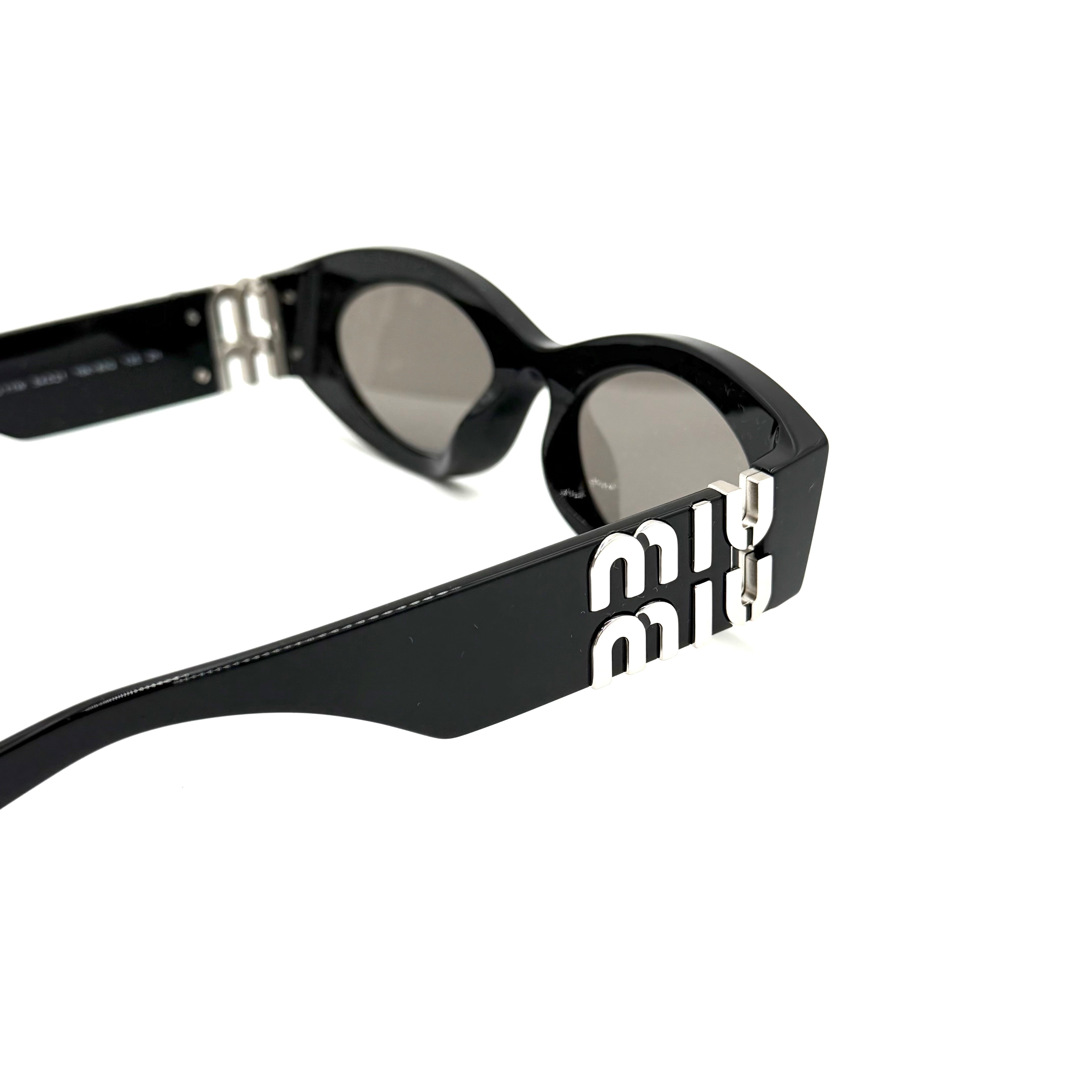 Miu Miu SMU 11w Sort med sølv