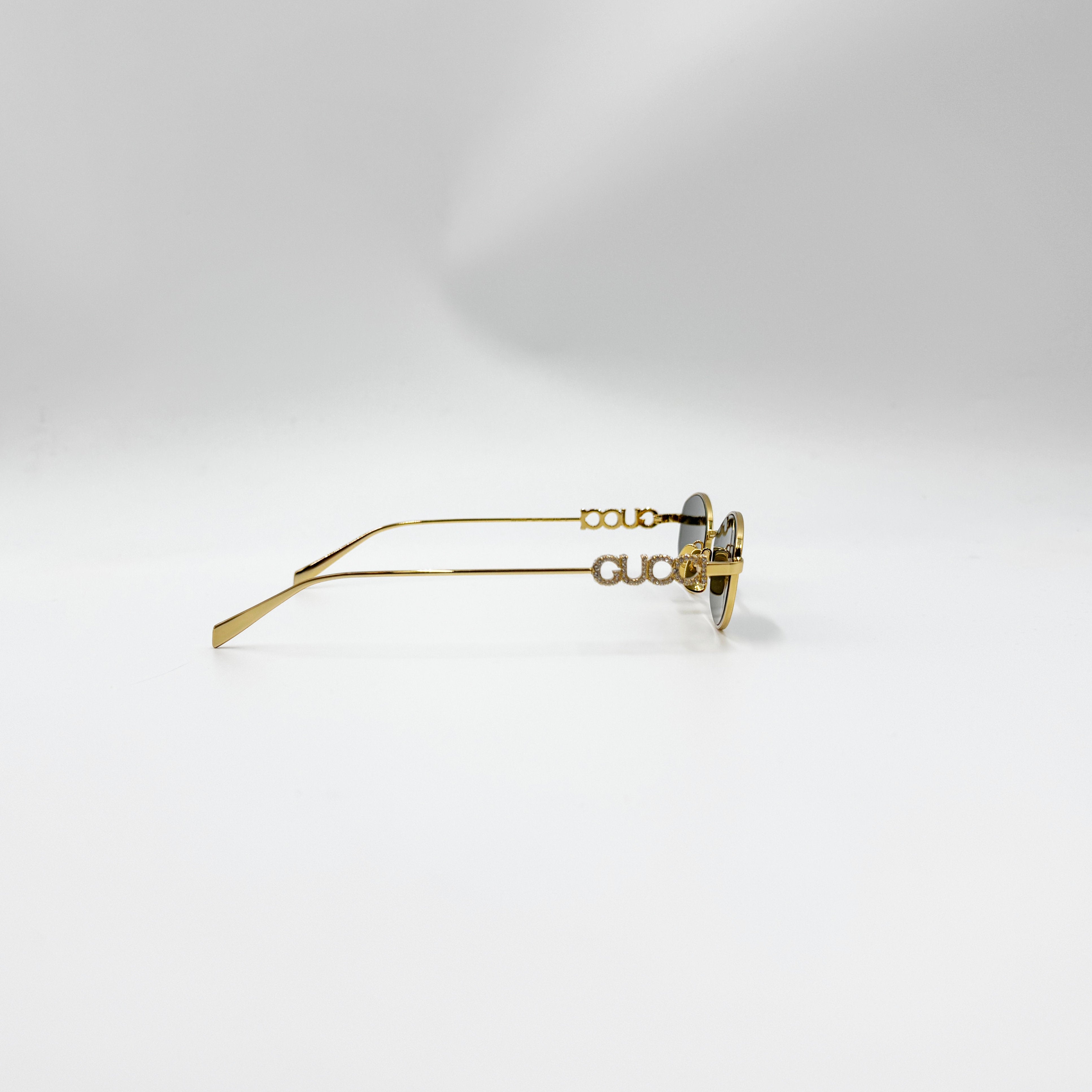 Gucci GG1802S guld med similisten