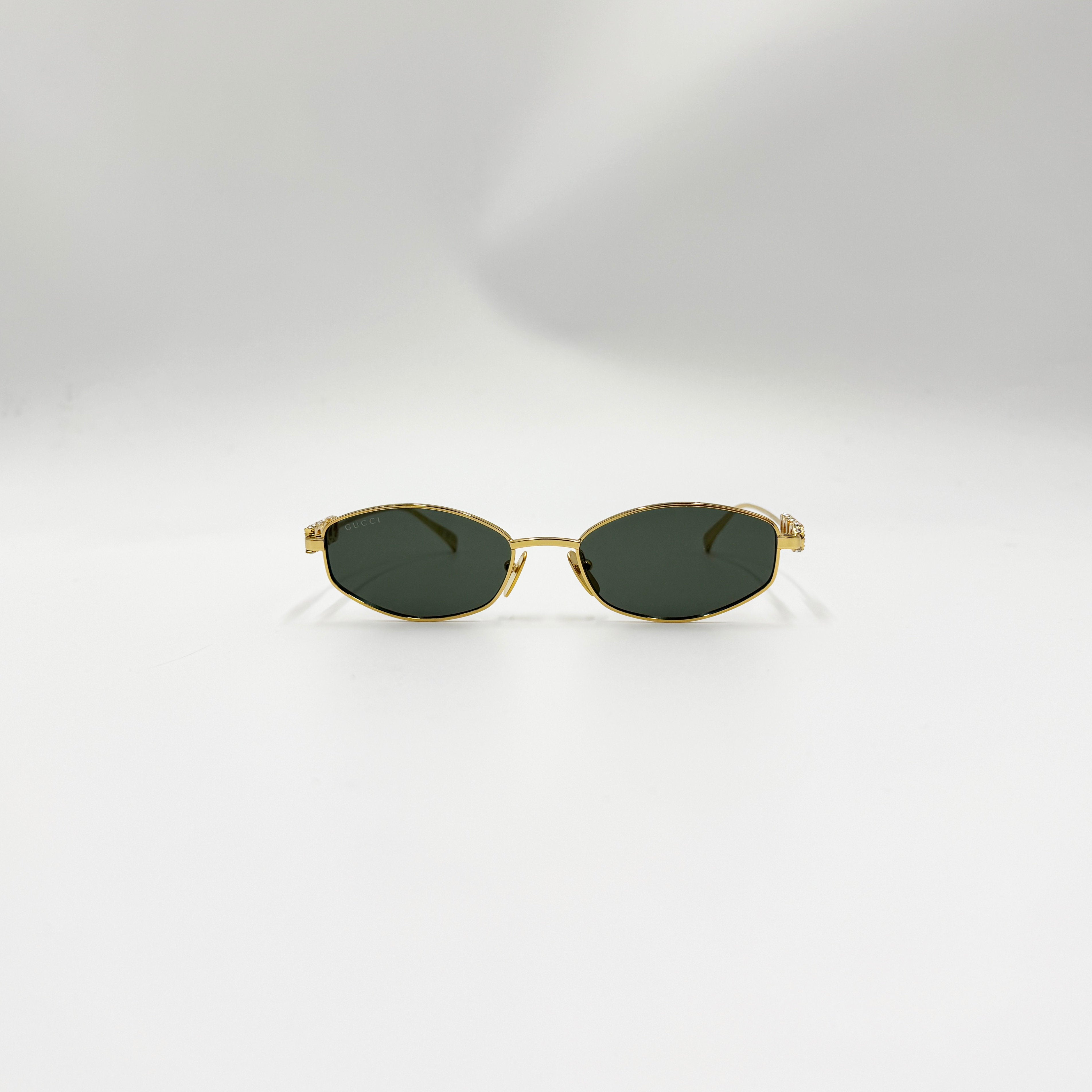 Gucci GG1802S guld med similisten