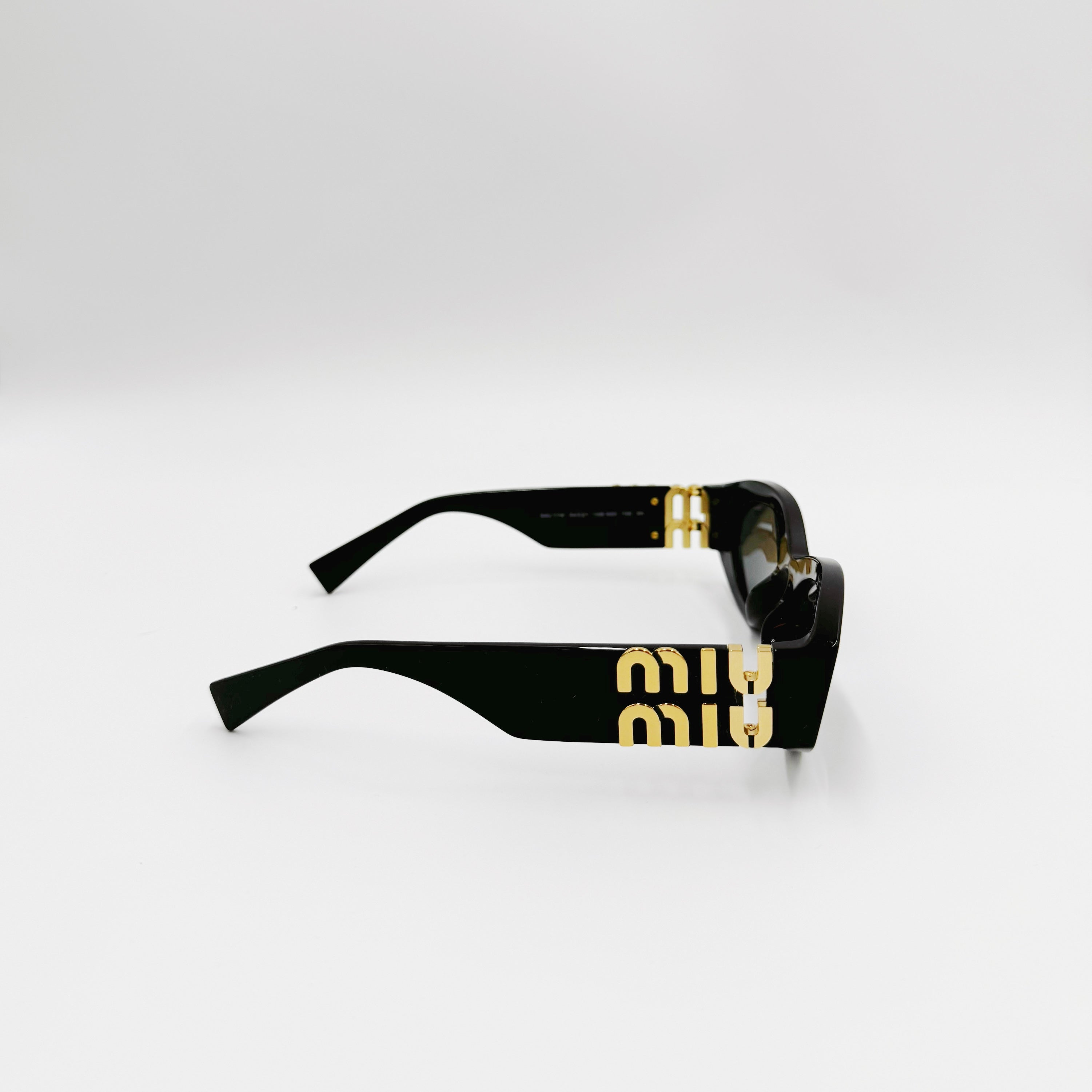 Miu Miu SMU 11WS sort